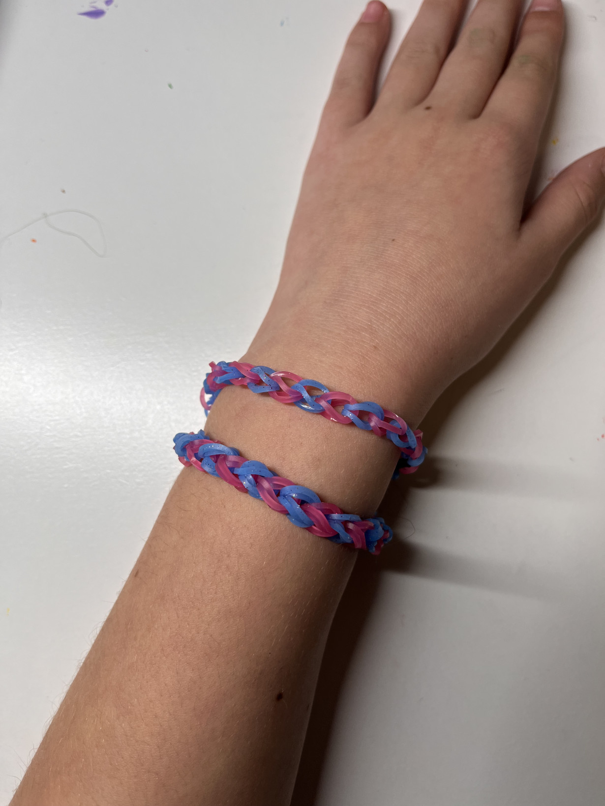 two pink and blue bracelet